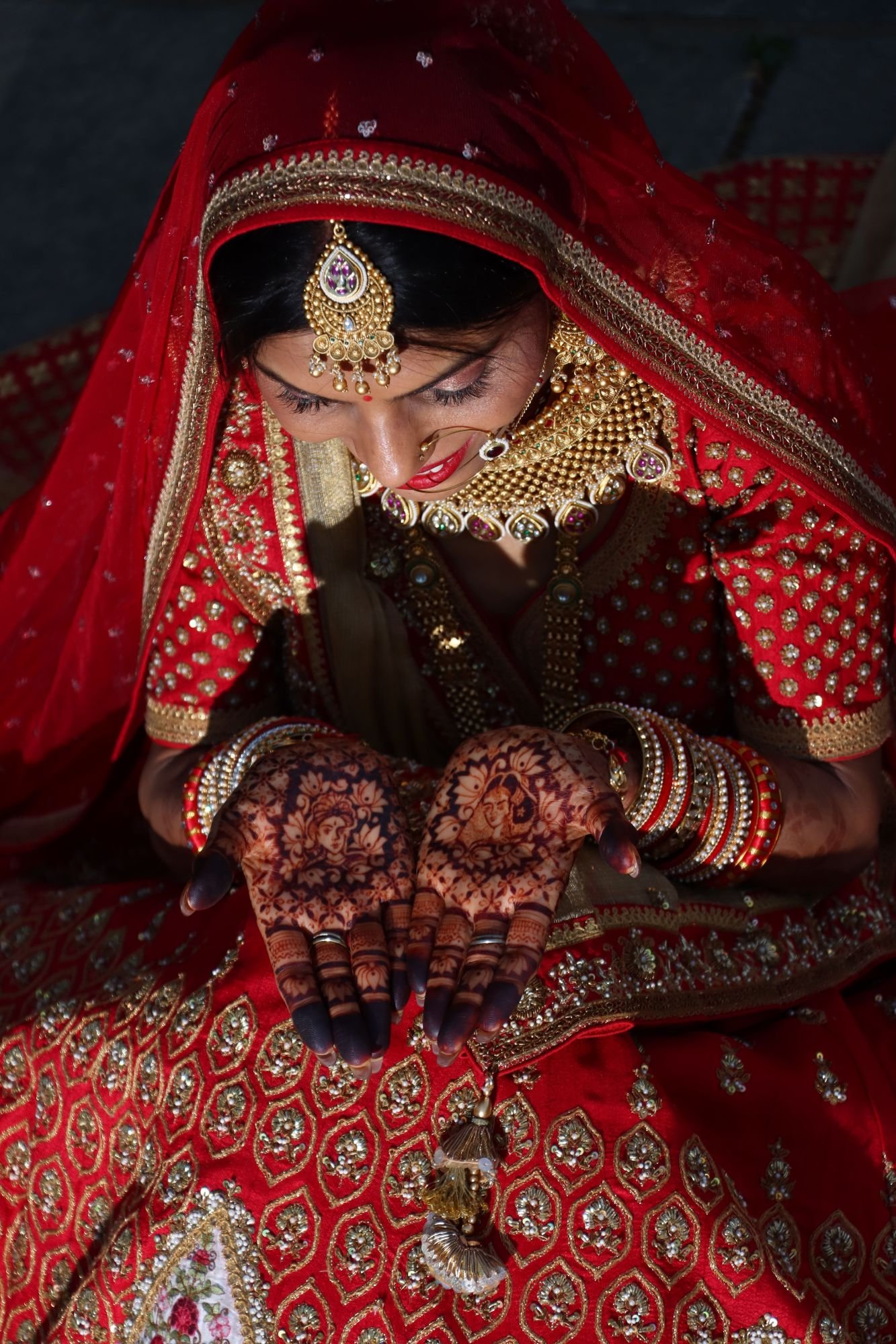 Bride admiring her bridal henna