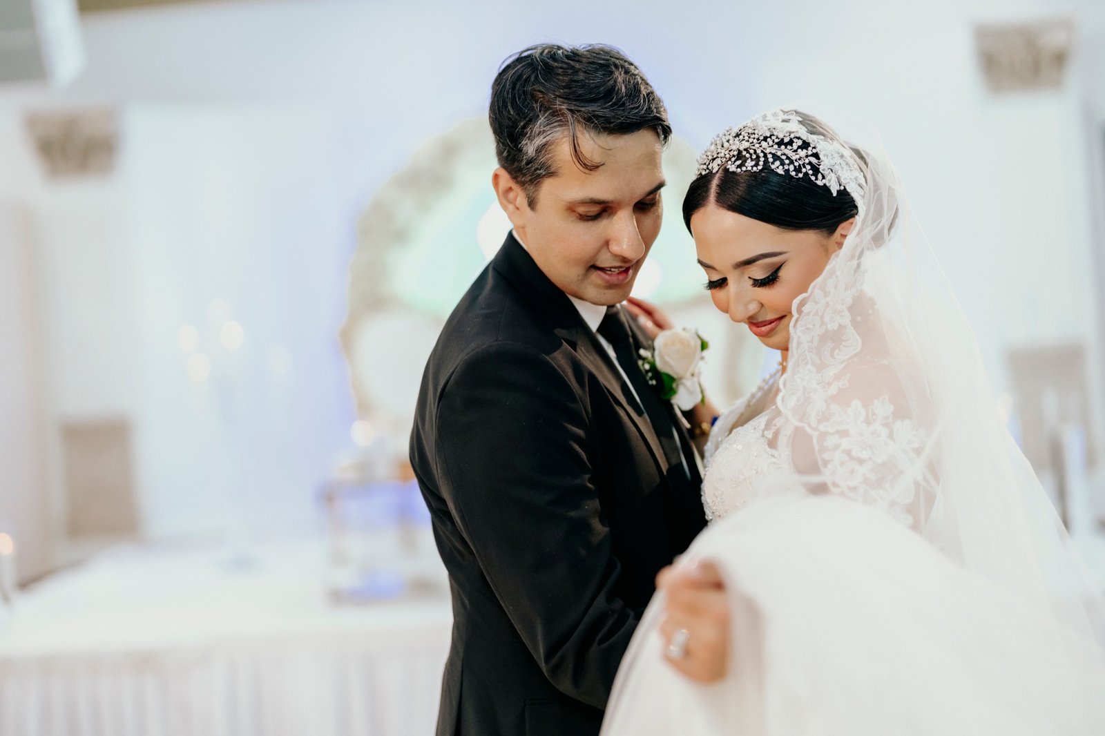 Bride and groom sharing an intimate moment, photographed by Aqeeq Production